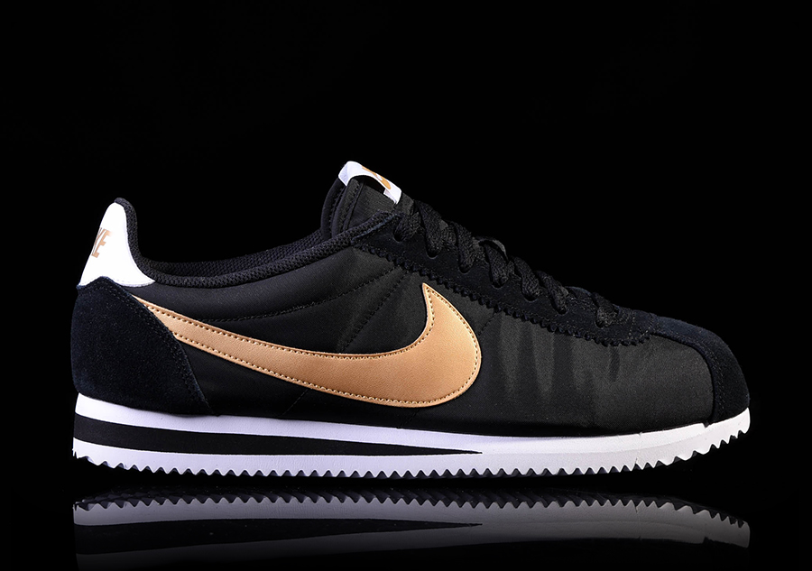 black and gold nike cortez