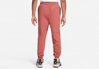 NIKE AIR JORDAN ESSENTIALS STATEMENT FLEECE PANTS CANYON RUST